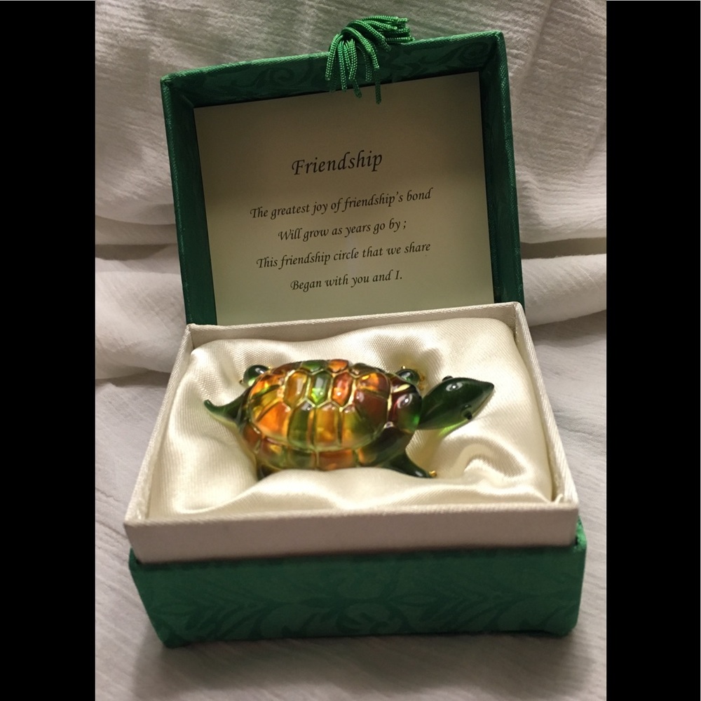 A glass Messenger Friendship turtle